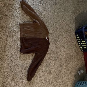 Two different colored brown sweater